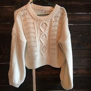 Lush pullover sweater. Cropped length